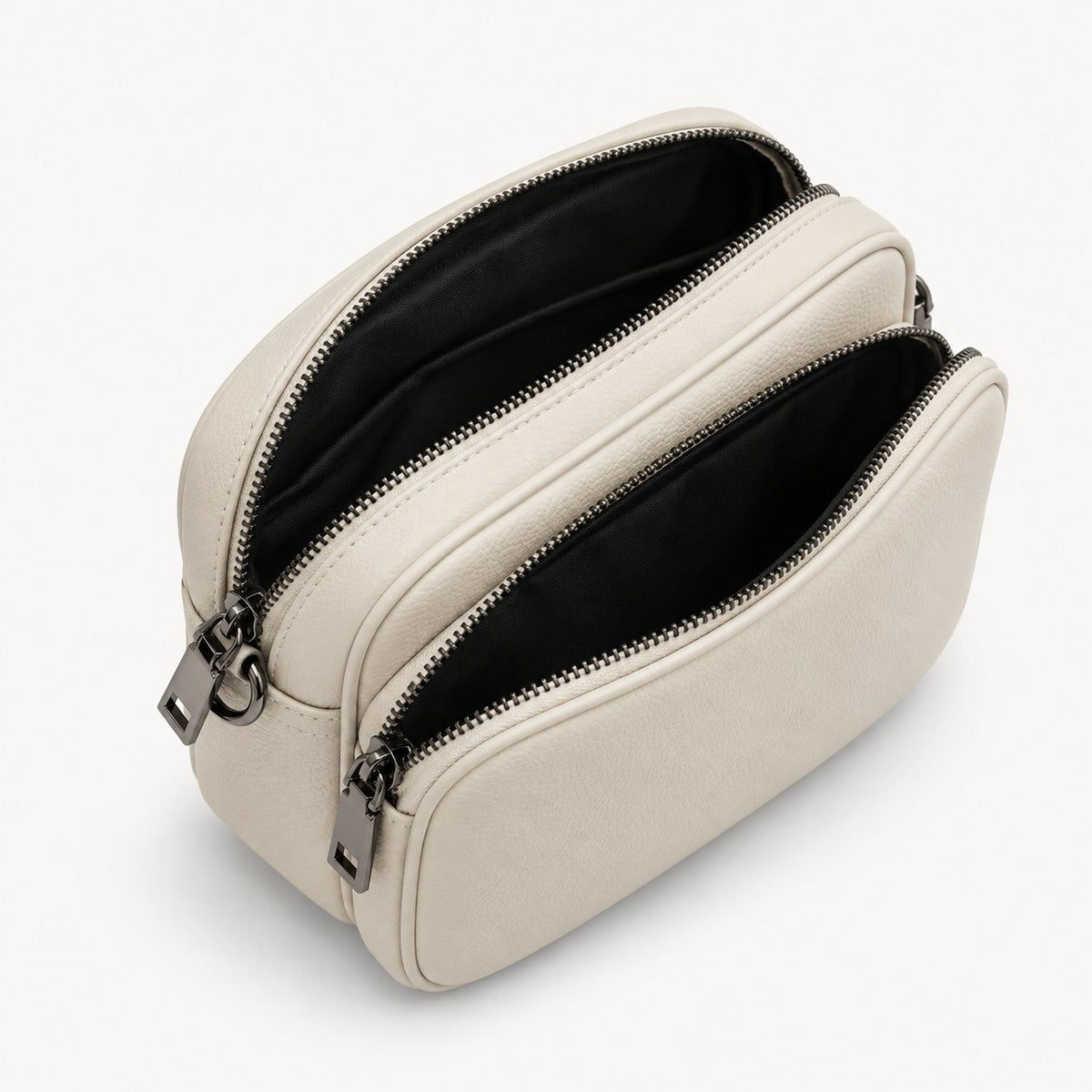 Rivarella Crossbody Bag in Stone with both zip compartments open